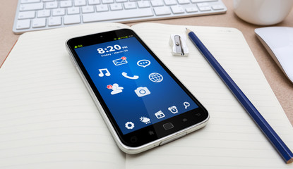 Workplace with modern mobile phone