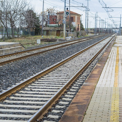 Fototapeta na wymiar Details of railway lines at Italian Train Station