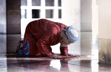 Religious muslim man praying