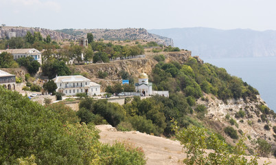 Obraz premium The view of sea coast in Sevastopol, with the orthodox monastery on it