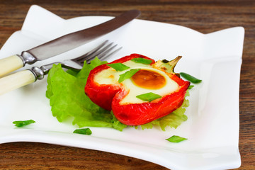 Dietary food without meat: egg, baked in sweet pepper.
