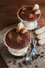 Italian dessert Tiramisu in a sundae dish