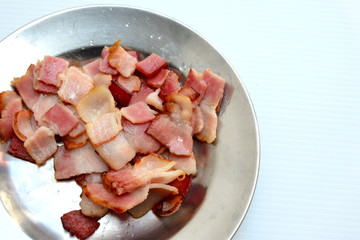 sliced bacon in dish