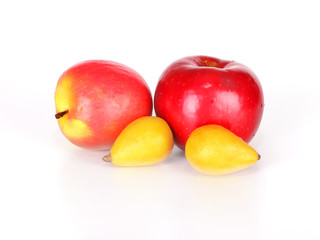 Red apples and loquats isolated over white background