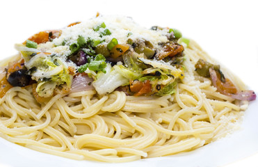 Spaghetti with vegetables and basil olives and cheese