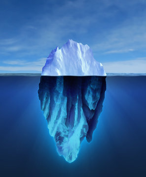 Big iceberg floating on blue ocean.