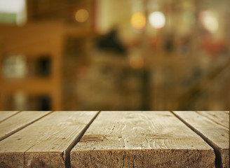 Old wooden board on living room background