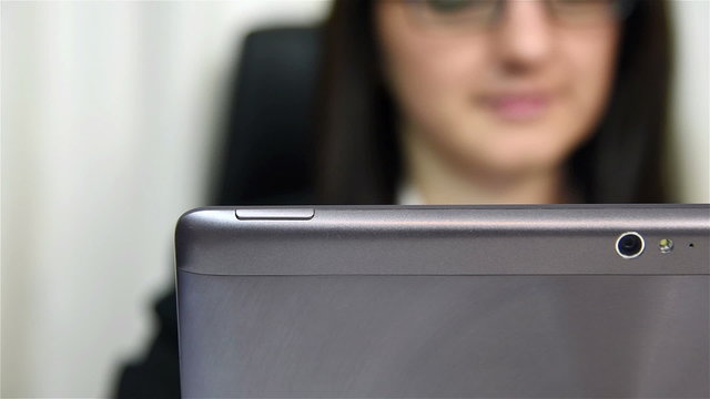 Businesswoman Using Laptop With Touchscreen, Close Up