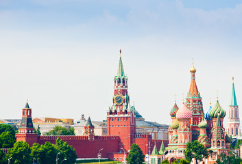 Spasskaya Tower and St. Basil's Cathedral on Red square in summer day. Moscow. Russia