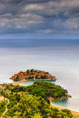 View of the peninsula of Sveti Stefan from the height of the mountains.