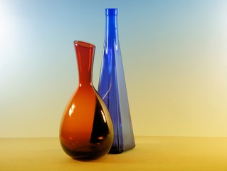 Vintage multicolor group of bottles in a row.