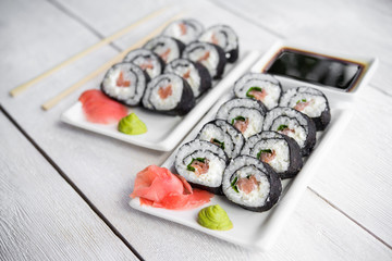 Salmon and cheese rolls on plate