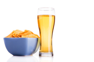 Glass of beer and chips isolated