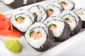 Closeup of sushi rolls with salmon