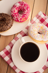 coffee cup and donuts