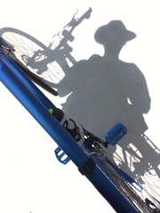 Shadow of bicycle and rider.