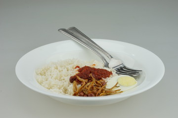 Nasi Lemak or Malay fragrant rice, cooked in coconut milk and pandan leaf