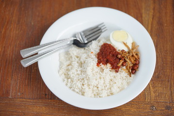 Nasi Lemak or Malay fragrant rice, cooked in coconut milk and pandan leaf