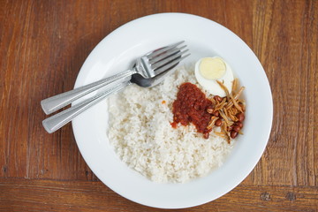 Nasi Lemak or Malay fragrant rice, cooked in coconut milk and pandan leaf