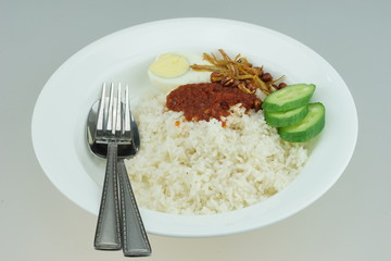 Nasi Lemak or Malay fragrant rice, cooked in coconut milk and pandan leaf