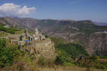 Fototapeta na wymiar Medieval Tatev monastery, Armenia, about IX century, big building is church of st. Poghos and Petros.Monastery is above the river Vorotans canyon. Goris region.