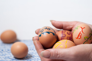 Painted eggs on hand