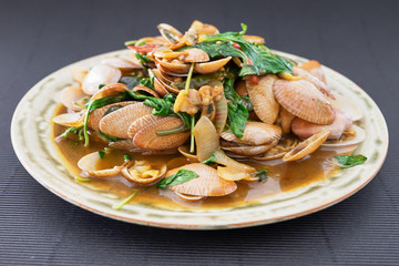 Hot and spicy stir fried  clams with oyster sauce