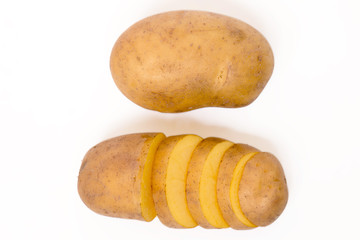 sliced potato and whole isolated on a white background.