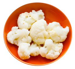boiled cauliflower with butter in bowl isolated