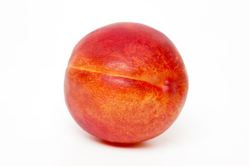 Tasty nectarine fruit isolated on white background.