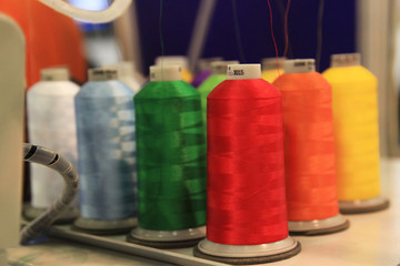 Colored thread on reels