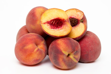 sweet peaches isolated on a white background.