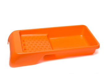 Orange plastic paint tray isolated in white background