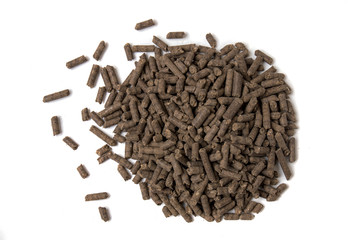 Pile of compressed organic fertilizer.