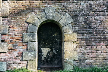 brick wall with arched entrance 3