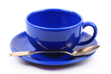 blue cup with spoon on white background isolated