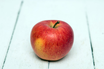 Fresh tasty red apple fruit isolated on a white background.