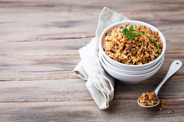 Quinoa with mushrooms and vegetables, selective focus