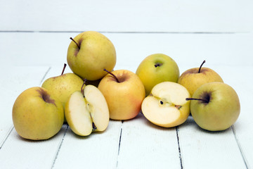 Fresh tasty yellow apple fruits isolated on a white background.
