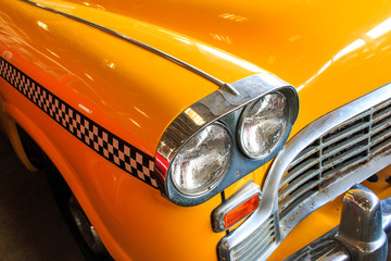 Yellow Cab Taxi, Color detail on the headlight of Taxi Checker