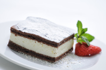 sponge cake with curd, mint leaf and strawberry on white plate, sweet dessert or breakfast, birthday cake, patisserie, photography for shop