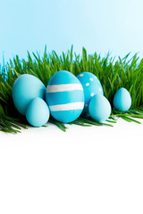 Row of Easter Eggs in grass