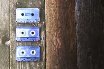 Audio cassettes on a wooden table