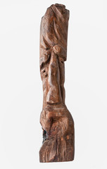 brown wooden idol on a white background