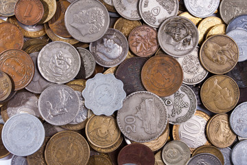 coins different countries as background