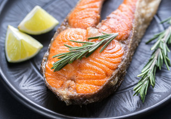 Roasted trout steak with fresh rosemary