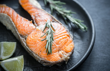 Roasted trout steak with fresh rosemary