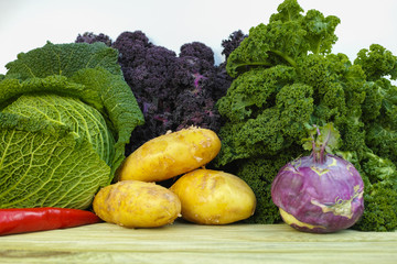 Fresh organic market vegetables on white background