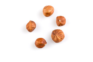 Hazelnuts on the white background