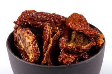 dried tomatoes on white background